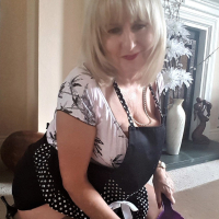 Naughty Lorna Blu having some fun with a big cucumber
