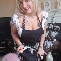 Naughty Lorna Blu having some fun with a big cucumber