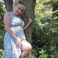 Sexy mature Lorna Blu showing her nice boobies outdoors