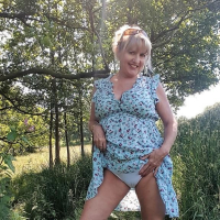 Sexy mature Lorna Blu showing her nice boobies outdoors
