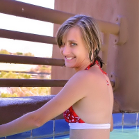 Paige Little has fun in the pool and shows off her amazing body