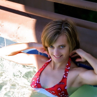 Paige Little has fun in the pool and shows off her amazing body