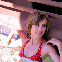 Paige Little has fun in the pool and shows off her amazing body