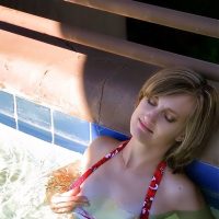 Paige Little has fun in the pool and shows off her amazing body