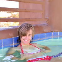 Paige Little has fun in the pool and shows off her amazing body