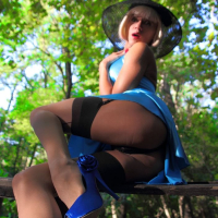 Lovely Lily Wow being naughty on a Park Bench