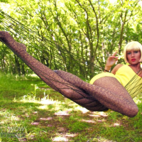 Lily Wow swinging in a Hammock in Pantyhose