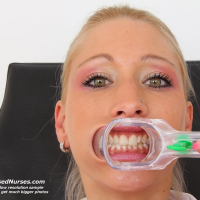 Good looking blonde nurse Uma Zex peels off uniform and gets off