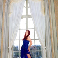 Redhead in latex dress