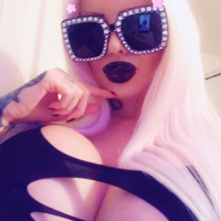 Sabrina Sabrok shows off her simply massive tits in several poses