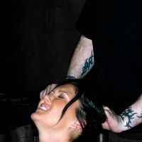 Claire Adams and Alexa Jordan together in leather strap bondage