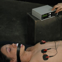 Hot brunette in bondage punished and fucked by mistress