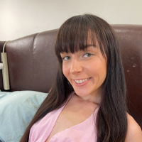 Knky amateur girl Emma Jade flashes her tiny tits and hairy pussy
