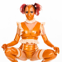 Lara Larsen dressed up in a kinky Rubber Doll Suit