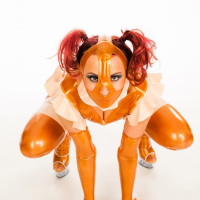 Lara Larsen dressed up in a kinky Rubber Doll Suit