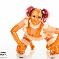 Lara Larsen dressed up in a kinky Rubber Doll Suit