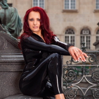 Fetish Model Lara Larsen in a sexy black Catsuit