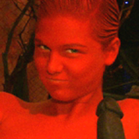 Ts Danni Daniels descends like a demon angel onto the red painted Chloe Camilla