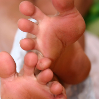 Lovely Katie Fey pampers her sexy feet