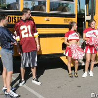 Three slutty cheerleaders starting a fervent orgy in the school bus
