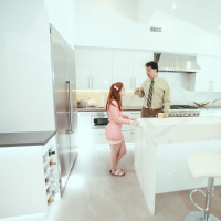 Pretty redhead babe Amber Addis fucked by an older man in the kitchen