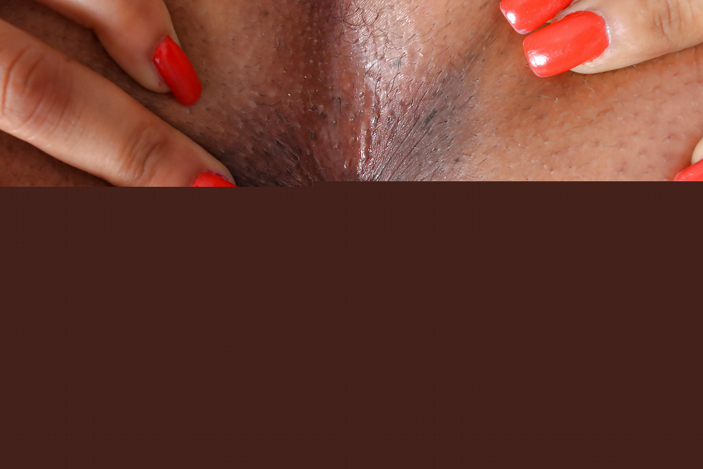 Black first timer Danni Lynne unleashing huge boobs and bald pussy from onesie - Photo #2000051