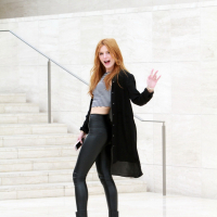 Bella Thorne shows off her ass and legs wearing black leather pants out in Holly