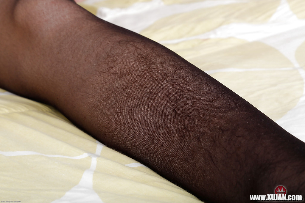 Hairy MILF Simone Delilah peeling off black nylons and lingerie to pose naked - Photo #2011533