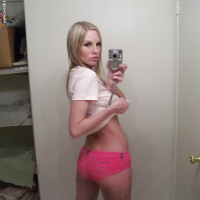 Big tit blonde Aimee undressing that stunning ass and pussy