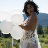 Angel Constance takes off her Clothes in a Field