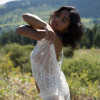 Angel Constance takes off her Clothes in a Field