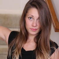 Candice Ferguson spreads her shaved pussy on the stairs