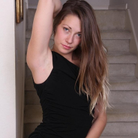 Candice Ferguson spreads her shaved pussy on the stairs