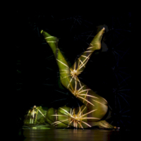Beautiful chicks Nika puts up a great performance during a light show