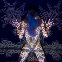Beautiful chicks Nika puts up a great performance during a light show