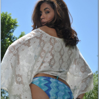 Graceful latina babe Isis Taylor slipping off her bikini outdoor