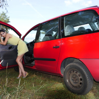 Saucy Coco Kiss gets fucked hard next to a red Car