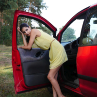 Saucy Coco Kiss gets fucked hard next to a red Car
