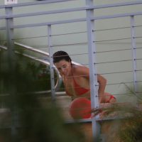 Eva Longoria shows off her round ass in a skimpy red bikini at the pool in Miami