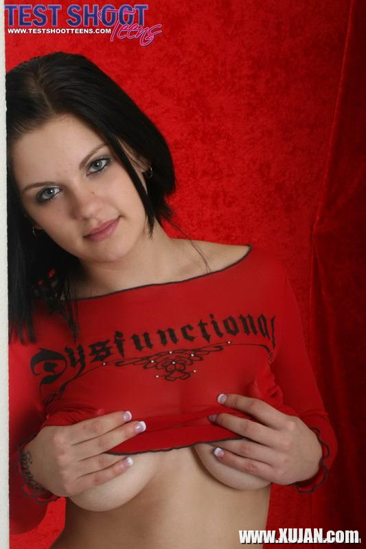 Sweet brunette teen Eva shows off her big boobs in a red top - Photo #2067391
