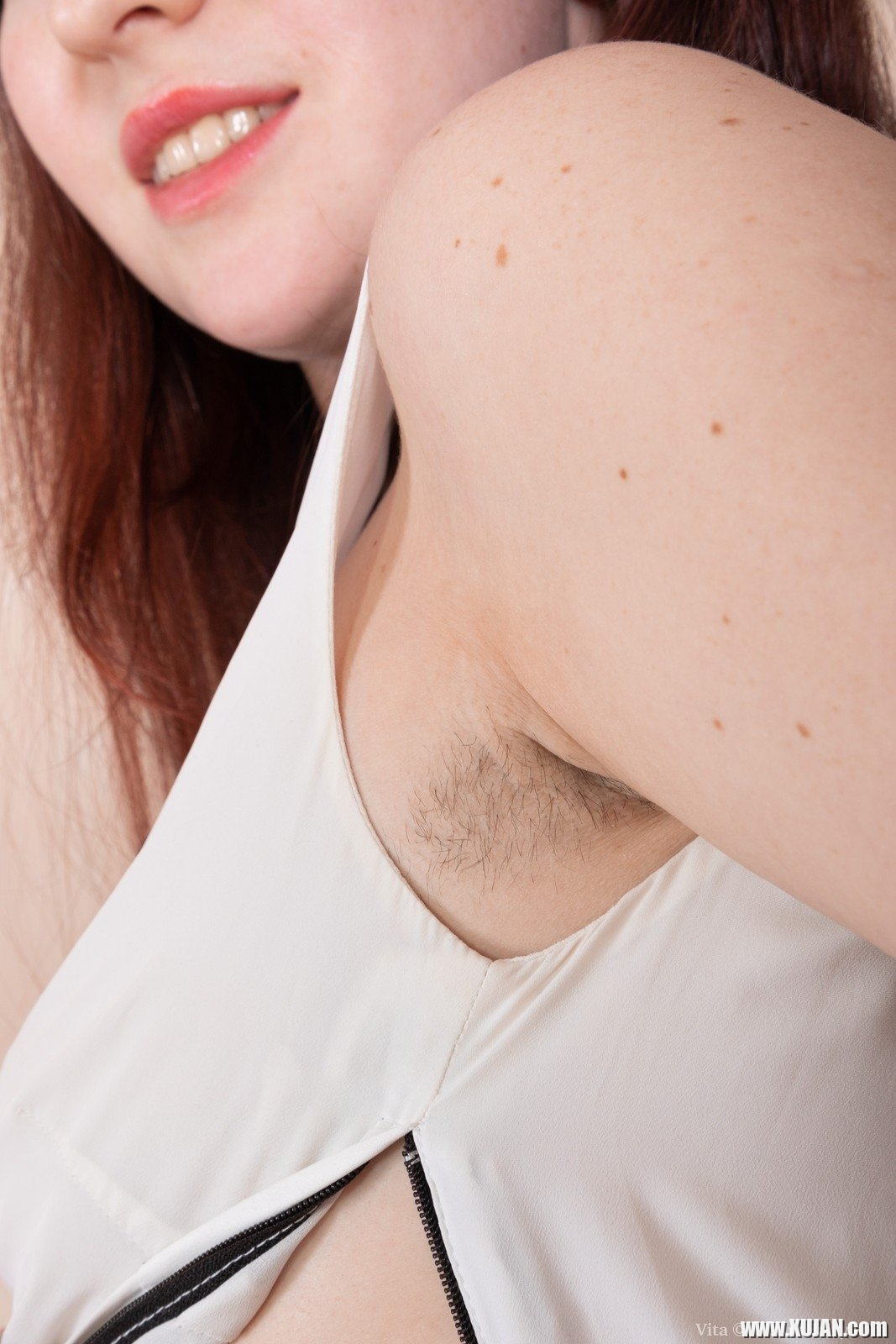 Vita is finishing work at her desk and is feeling the urge to masturbate She slowly undresses and shows us her body She starts touching her hairy pussy and then rubs her clit with grace as she orgasms - Photo #2071911