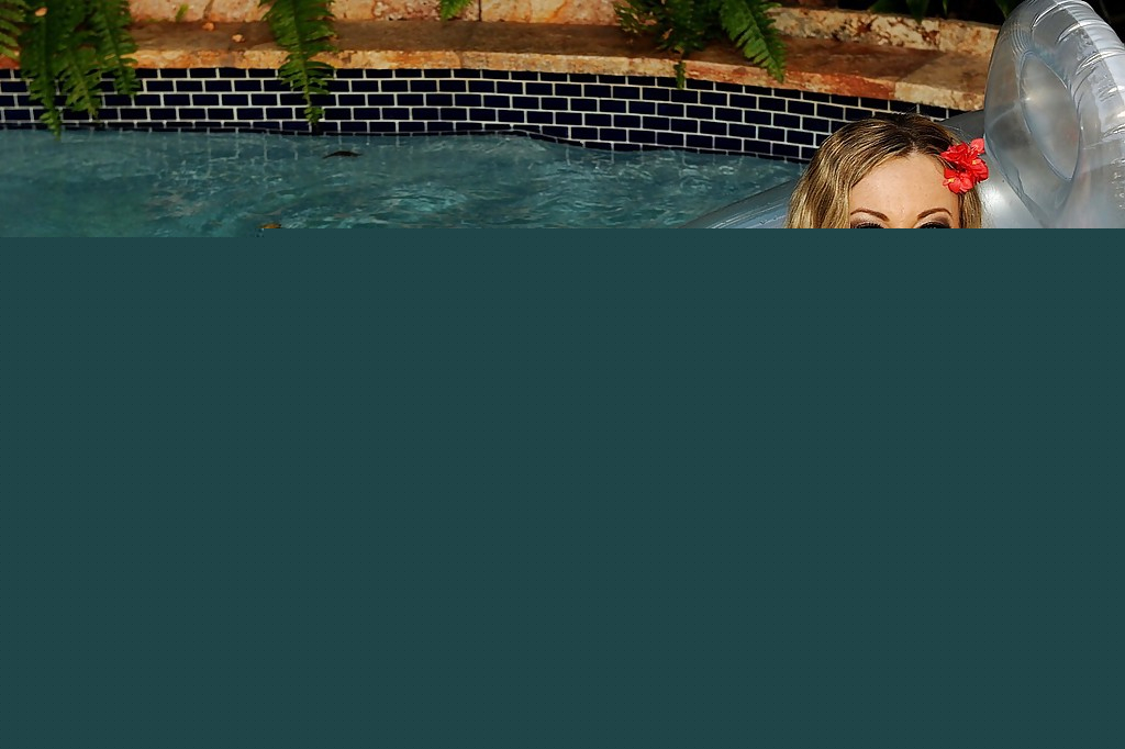 Busty model Anita Dark is lying in the pool with spread legs - Photo #2086652