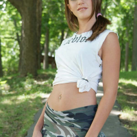 Ponytailed brunette teen Melissa dildoing her pink pussy