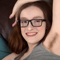Billie Rae is wearing all grey today as she shows off her glasses and hairy pits She relaxes on her sofa and strips nude She spreads her legs and shows off her hairy bush and hairy body