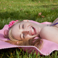 Beautiful blonde teen Stacie Jaxxx loves teasing at a public park