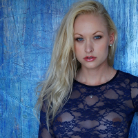 Seriously hot blond babe posing sexy seethru leotard