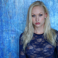 Seriously hot blond babe posing sexy seethru leotard