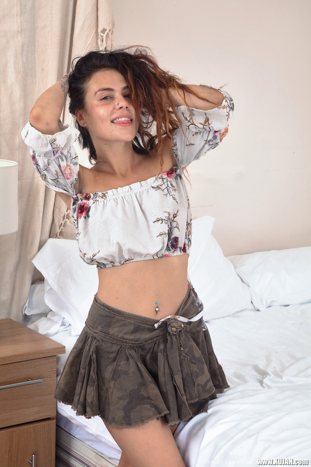 In her bedroom Sweet Mary Jane loves being naughty She starts to strip naked on her bed and puts on quite a show She touches her hairy bush as she spreads her legs and look amazing there - Photo #2123115
