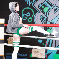 Dark haired pornstar Aria Alexander removing shorts in long socks