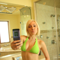 Lovely amateur Lilly Lebeau getting naked and picturing herself
